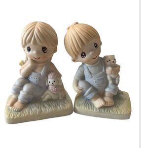 Vintage Boy & Girl porcelain sitting figurines EVC no chips cracks or fading